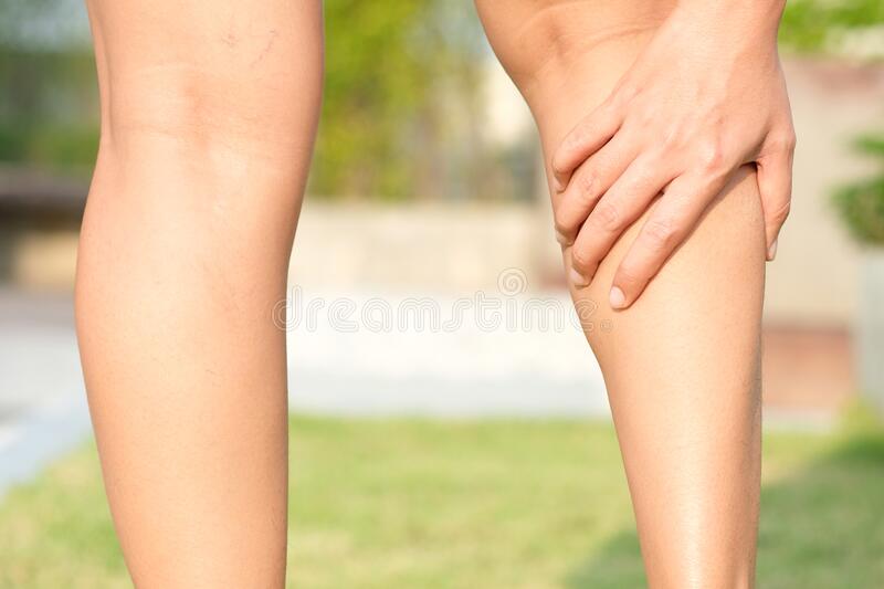 Leg Muscle Pain.young Man And Grasped His Muscles. With Foot Pain And ...