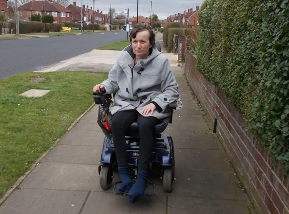 Woman in wheelchair stripped of disability benefits ...